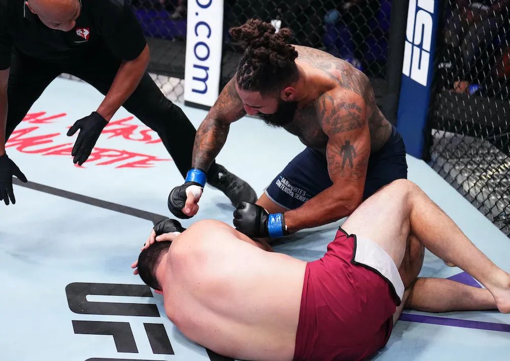 Austen Lane rains down ground and pound on Richard Jacobi. Credit: MMA Junkie.