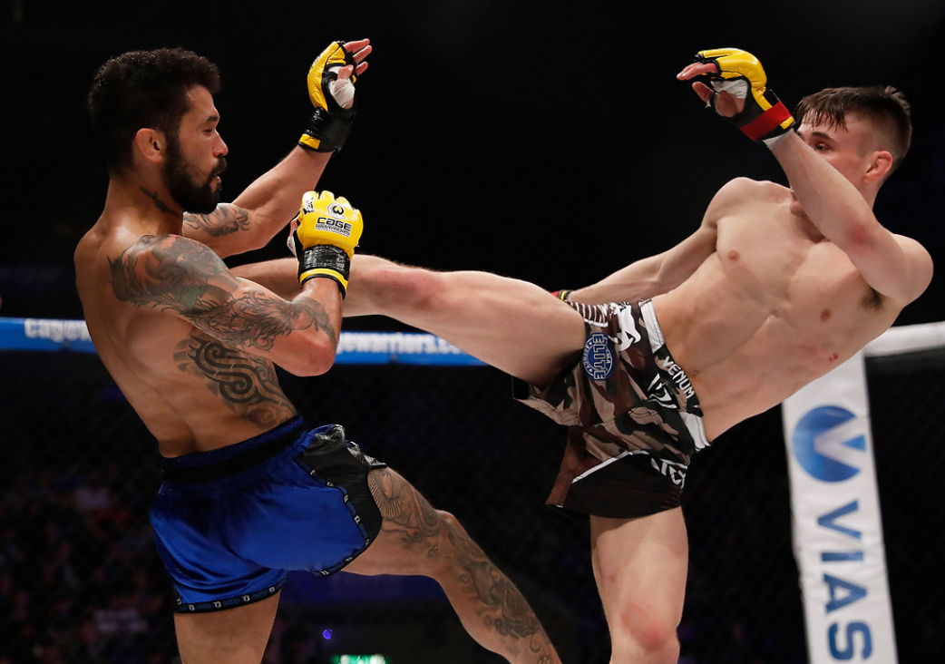 Nathaniel Wood striking with Vaughan Lee in his Cage Warriors debut. Credits to: Dolly Clew - Cage Warriors.