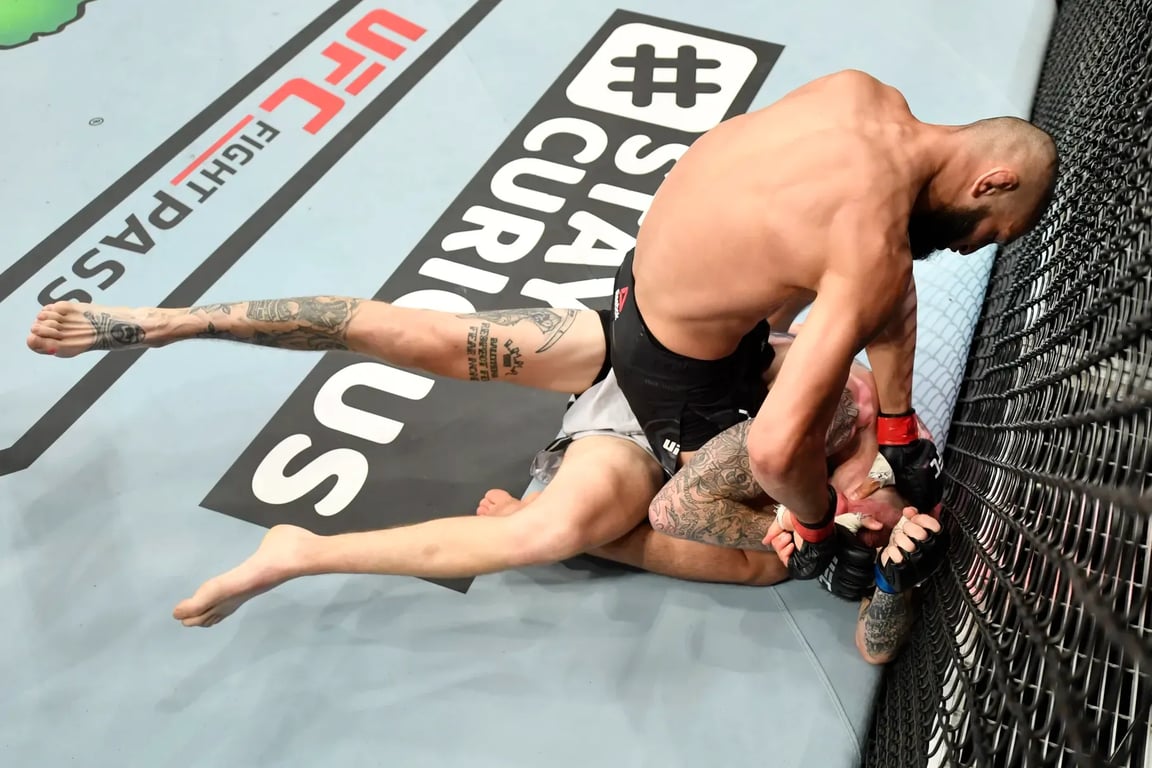 Khamzat Chimaev in full mount against Rhys McKee - Jeff Bottari/Getty Images