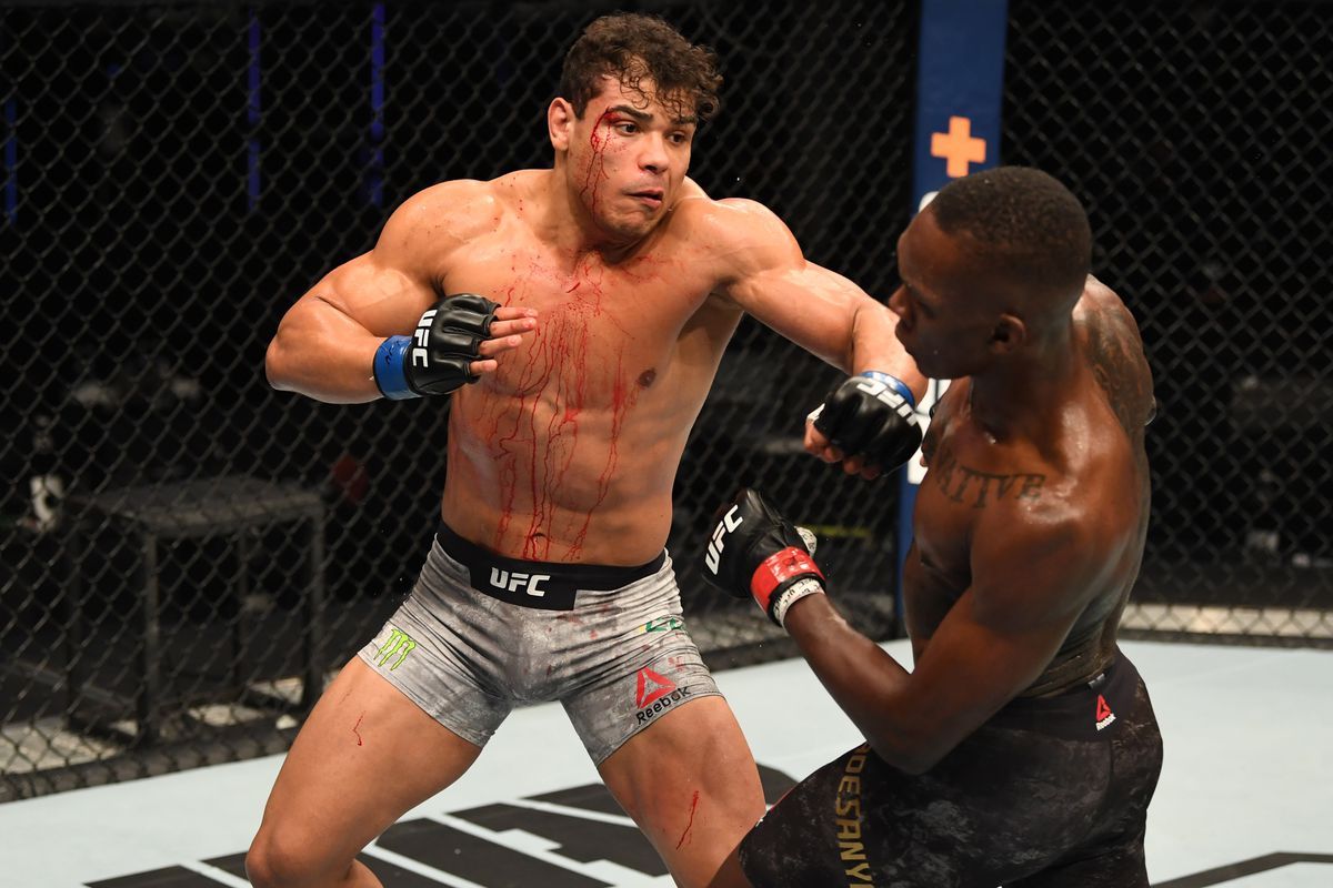 Israel Adesanya slips a jab from Paulo Costa. Credit: MMA Fighting.