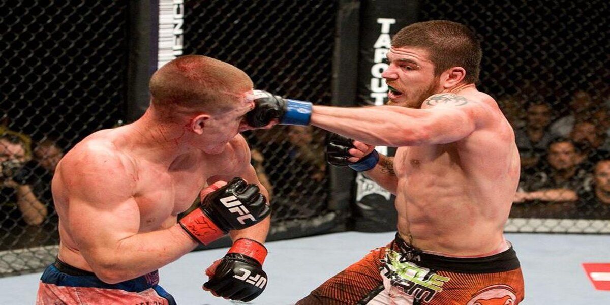 im Miller (orange/black shorts) def. Mac Danzig (blue/white shorts) - Unanimous Decision during UFC 100 at Mandalay Bay Events Center on July 11, 2009 in Las Vegas, Nevada. (Photo by Josh Hedges/Zuffa LLC.