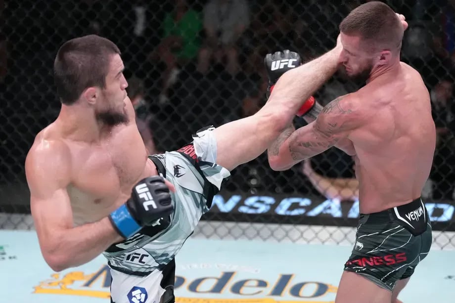 Umar Nurmagomedov landing a flush head kick on Nate Maness. Credits to: Jeff Botari - Zuffa LLC.