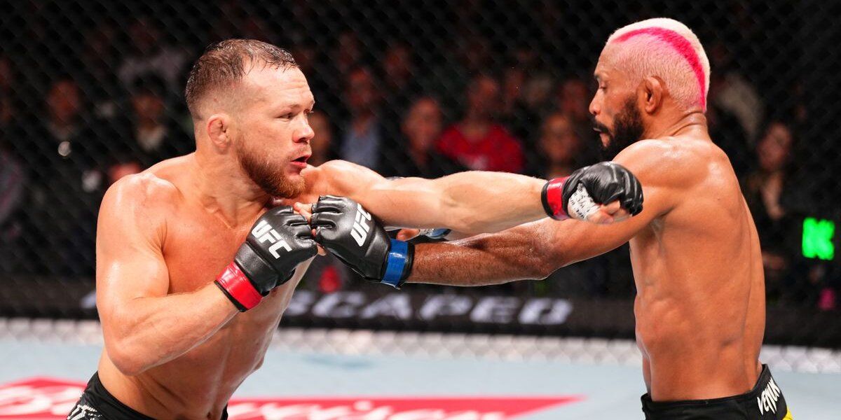 Petr Yan fighting with Deiveson Figueiredo. Credit: Jeff Bottari/ Zuffa LLC
