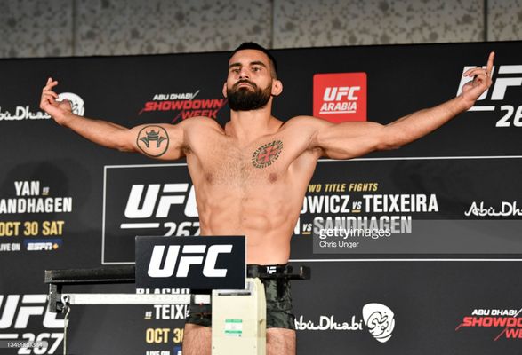 Benoit Saint-Denis weighing in before UFC 267. Photo by Chris Unger, Zuffa LLC.