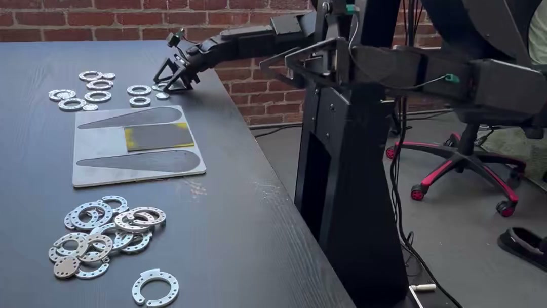 Almond's dual-arm Axol robot deburring spacers