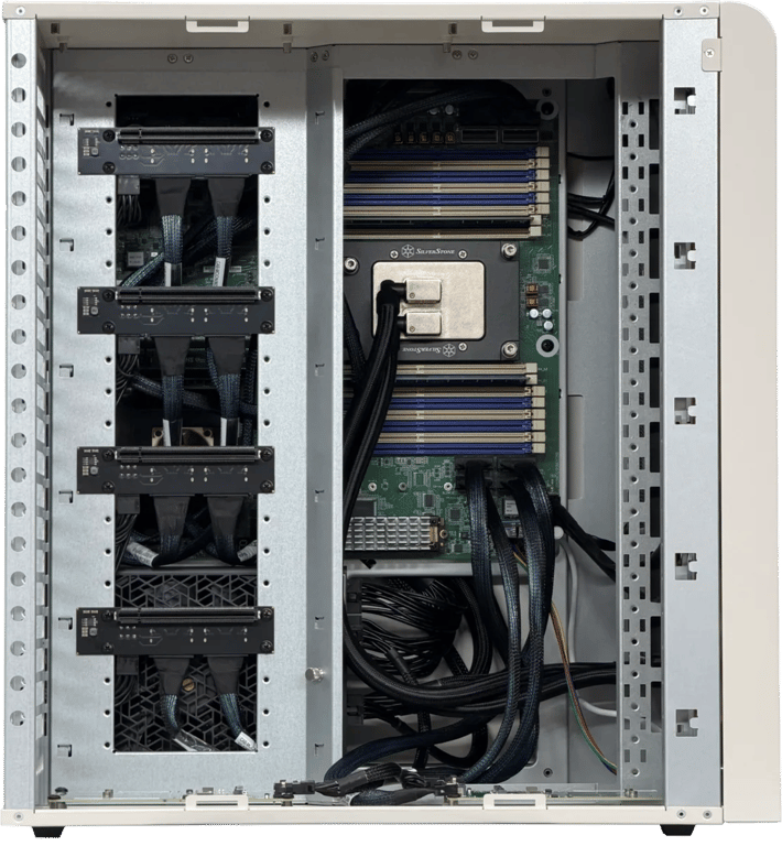 Interior of the configurable tinybox showing GPU slots and cooling hardware