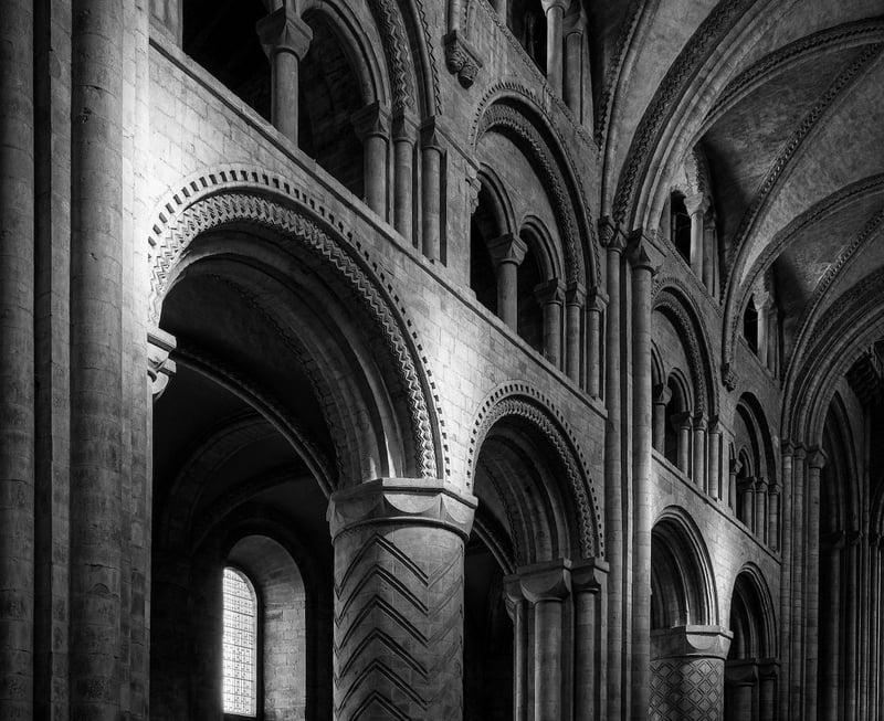 Looking northeast from the nave - light on the north side columns and arches