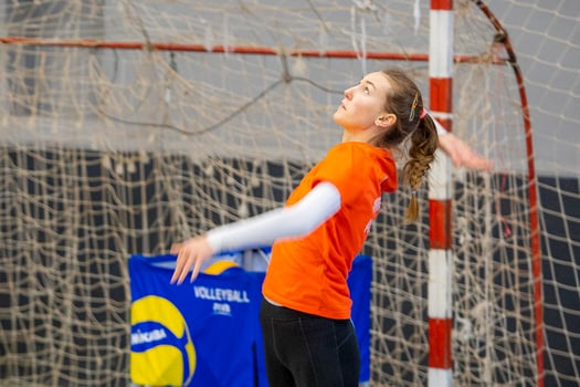 Volleyball professional Kateryna Dubova serving