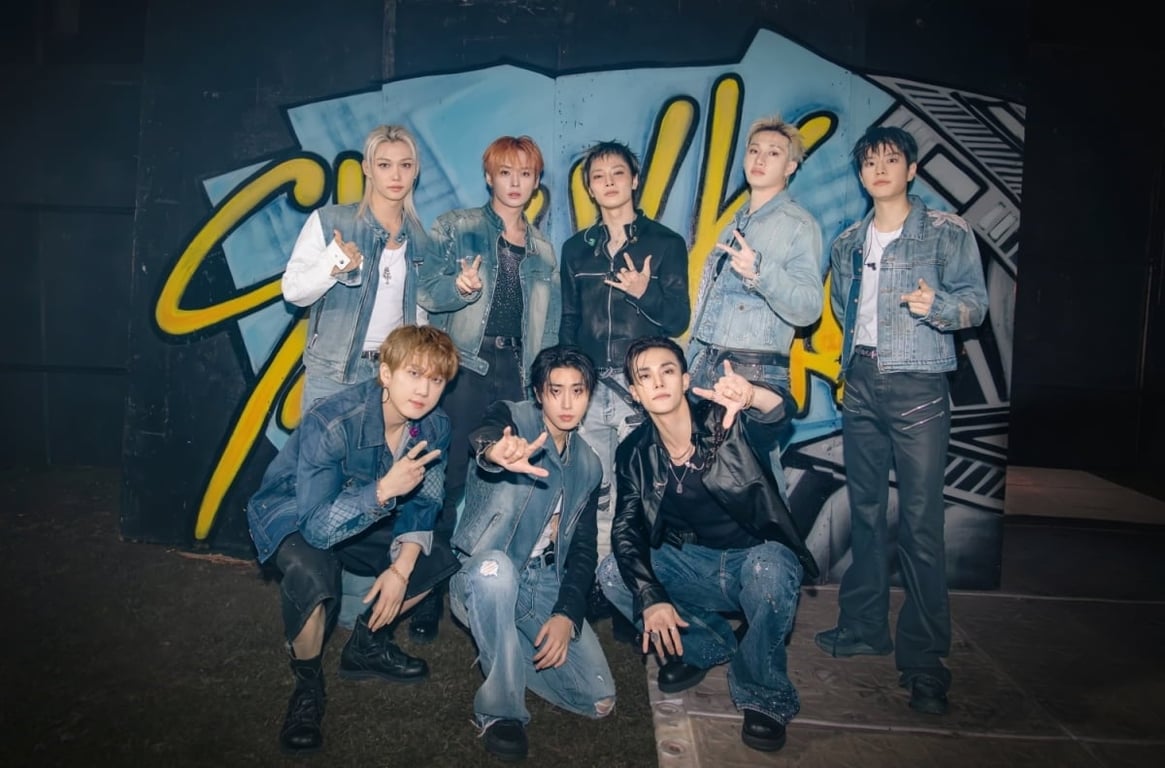 Stray Kids in a group photo for "STRAYCITY" / JYP Entertainment