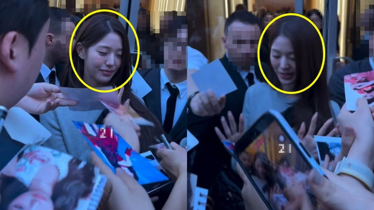 IVE member Jang Won-young is shown squeezing her eyes shut in response to a flood of autograph requests, then immediately raising both hands to signal that she cannot sign any more. / Photo=Screenshot from social media