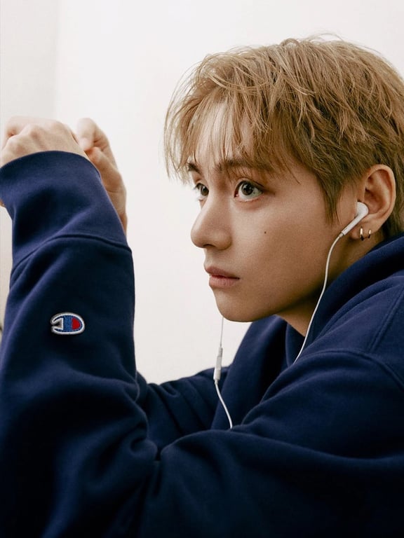 BTS' V wearing wired earphones