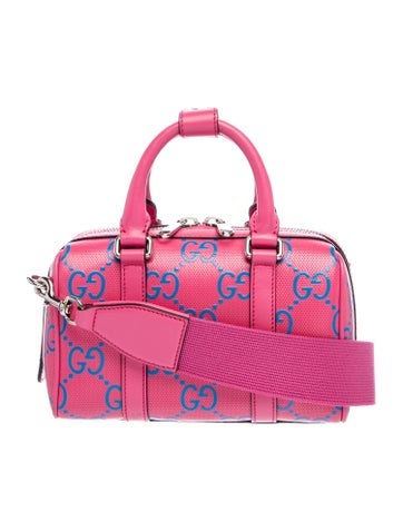 GG Embossed Top Handle Bag