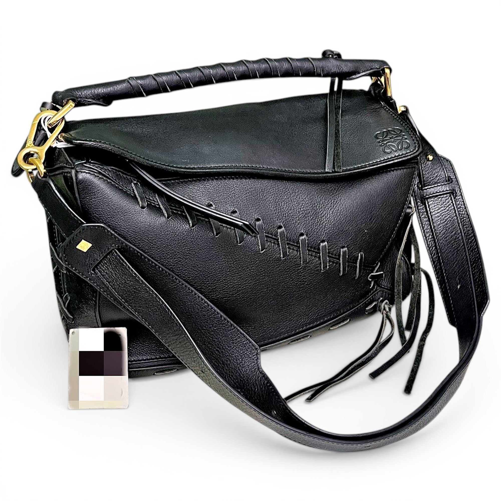 Puzzle leather handbag
