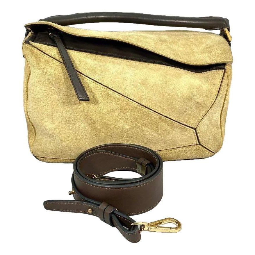 Puzzle leather handbag
