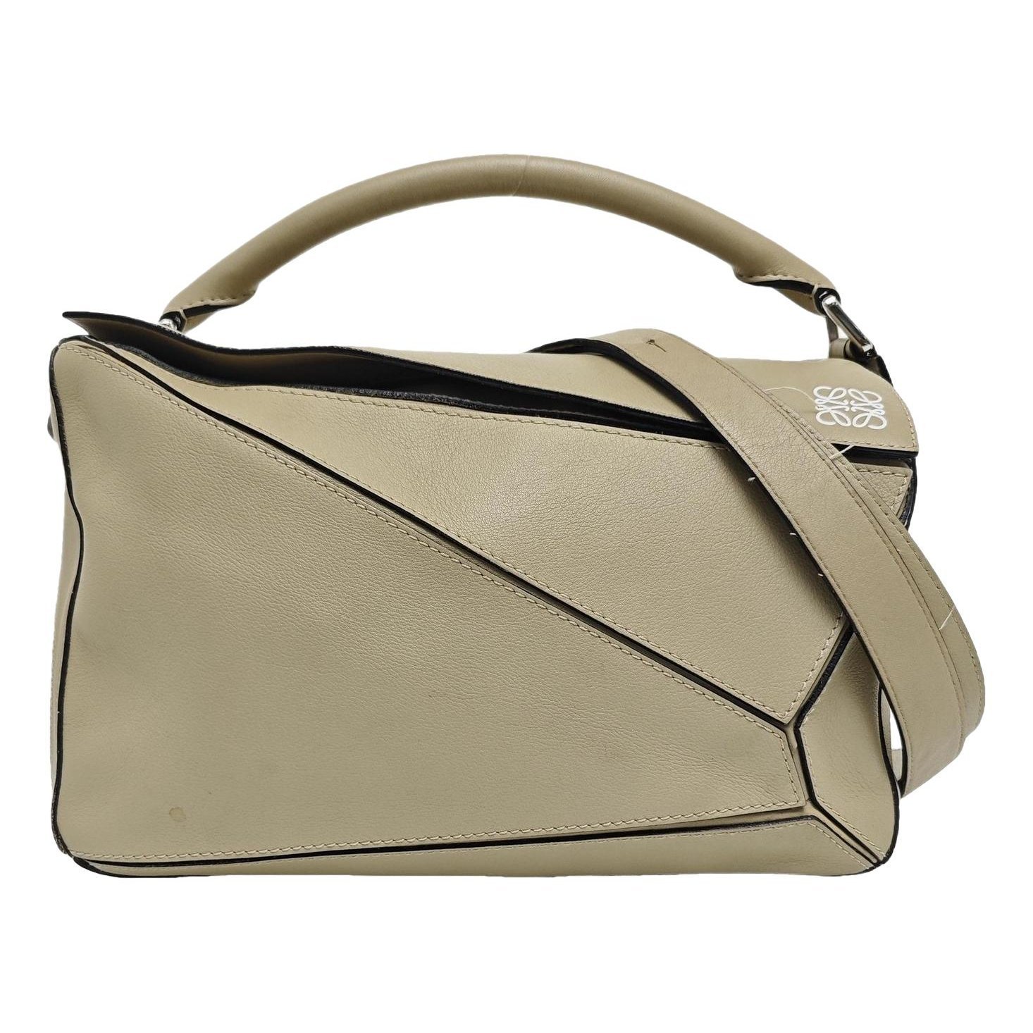 Puzzle leather handbag