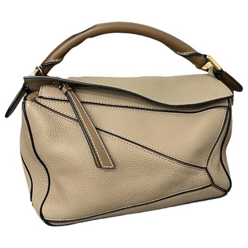 Puzzle leather handbag