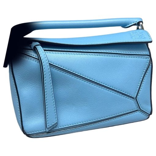 Puzzle leather handbag