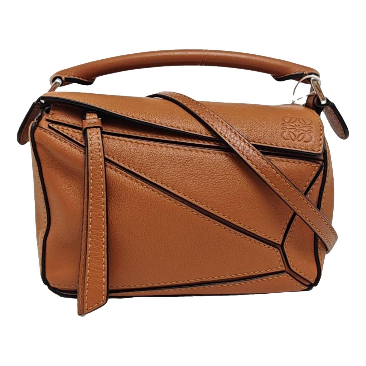 Puzzle leather handbag