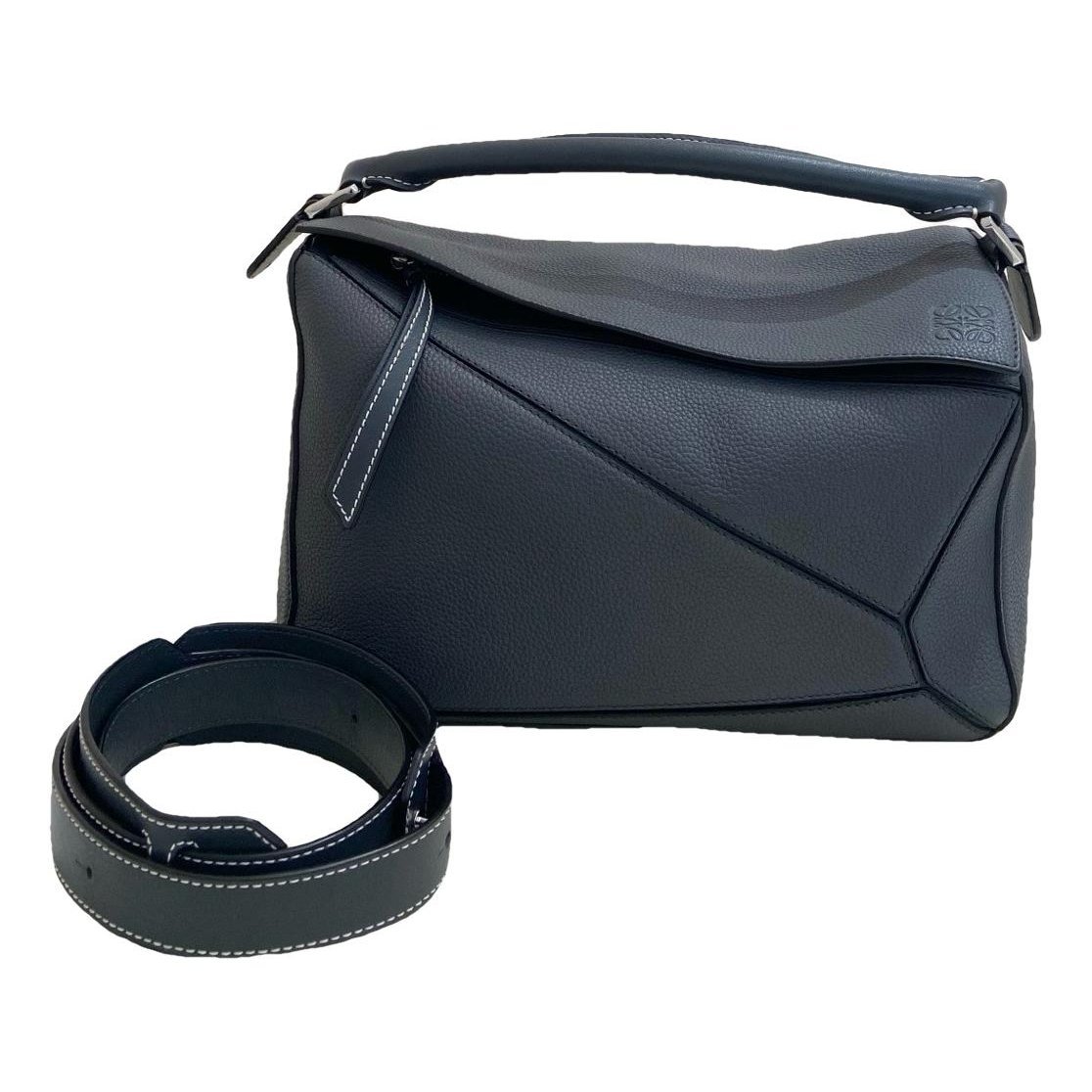 Puzzle leather handbag