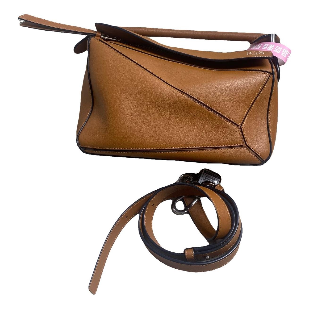 Puzzle leather handbag