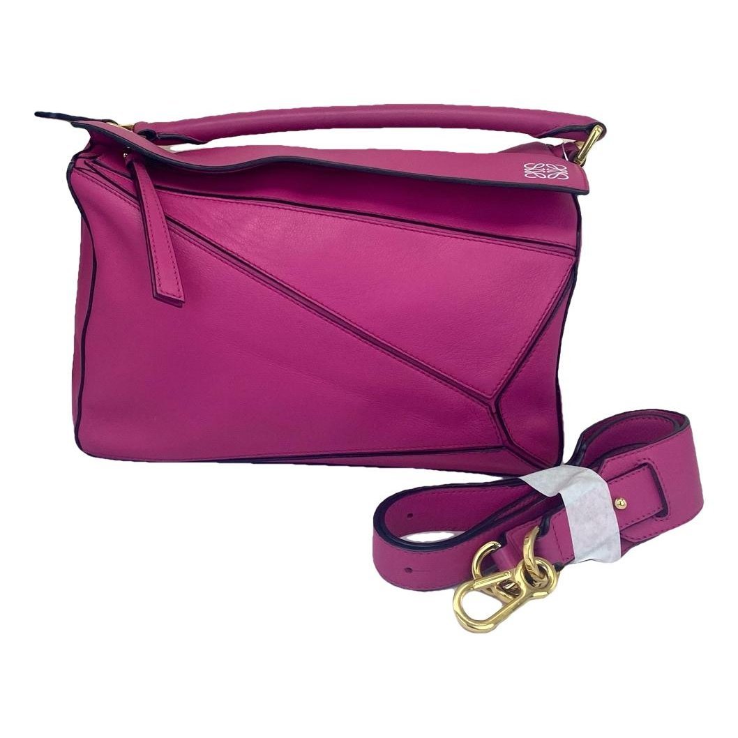 Puzzle leather handbag
