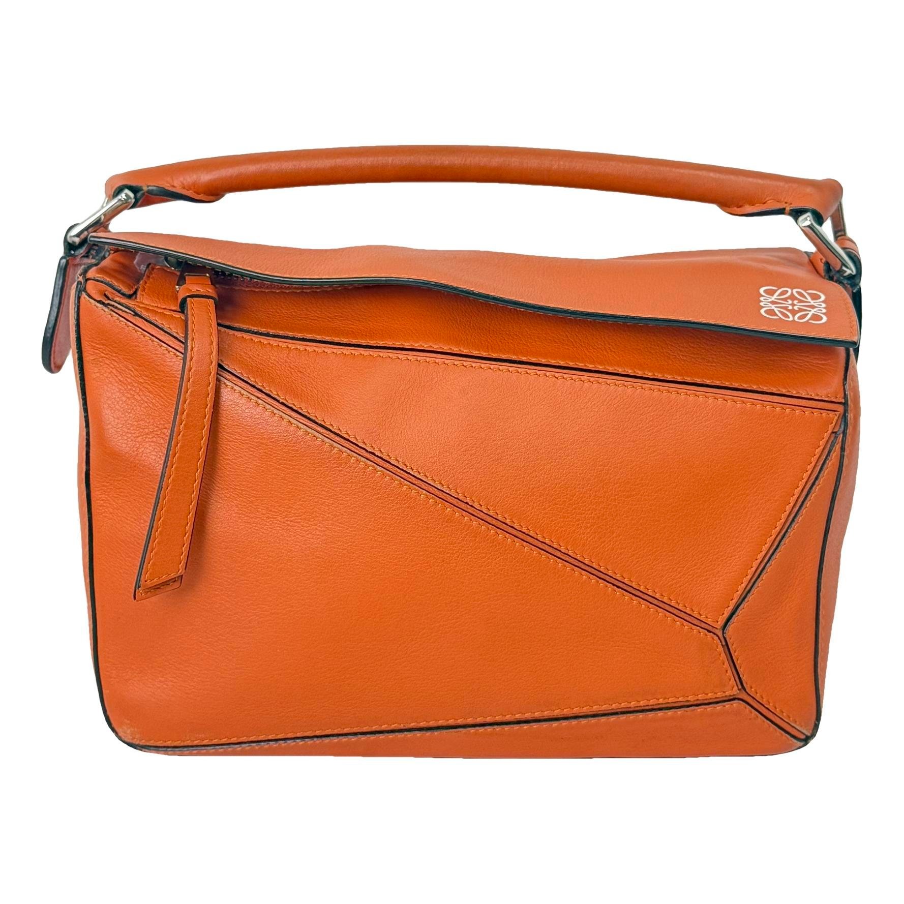 Puzzle leather handbag