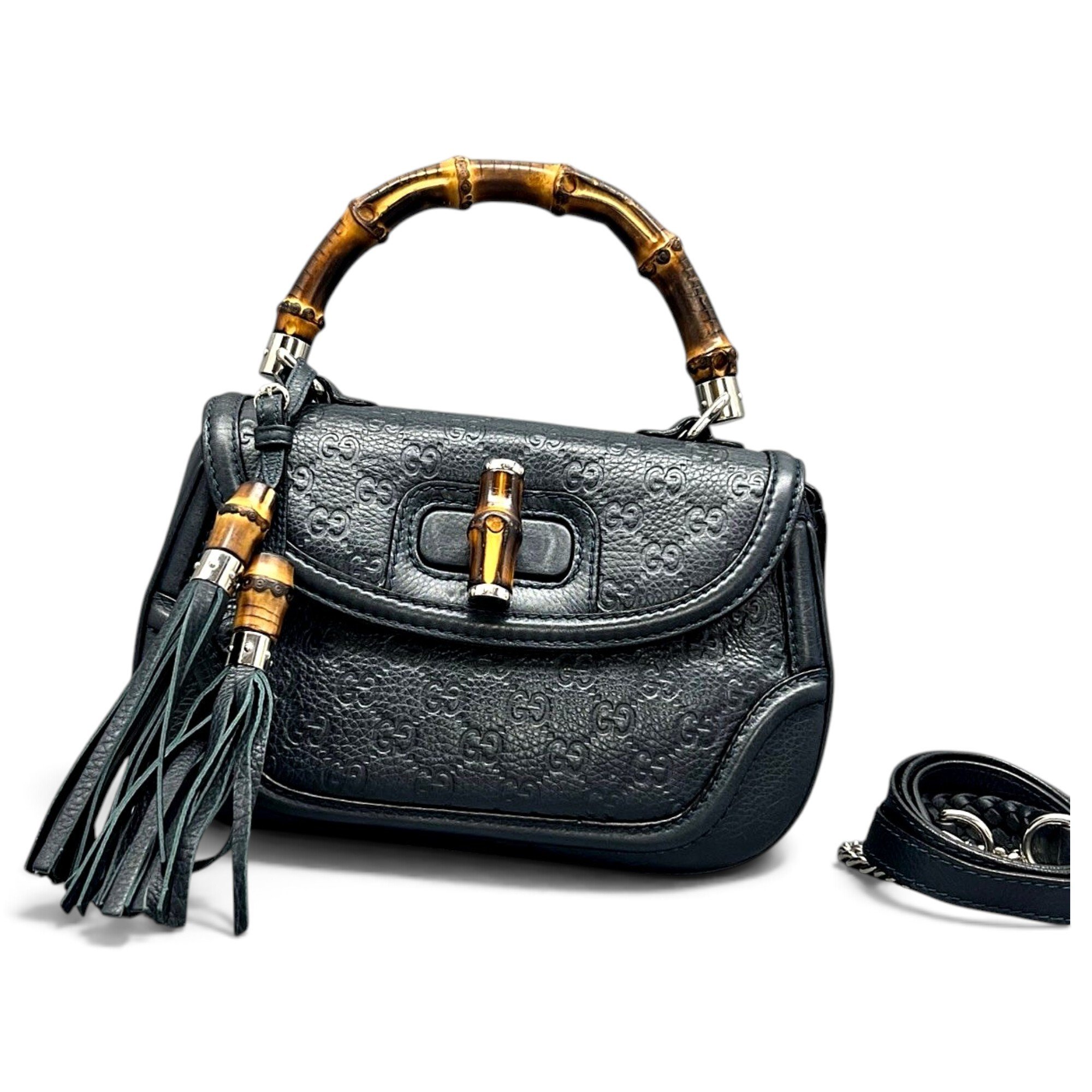 Convertible Pompon Bamboo Top Handle leather handbag