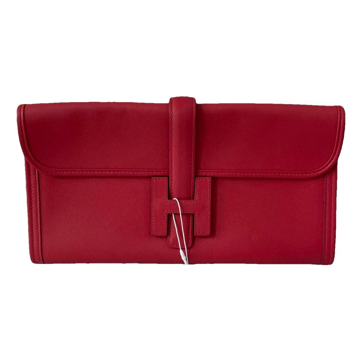 Jige leather clutch bag