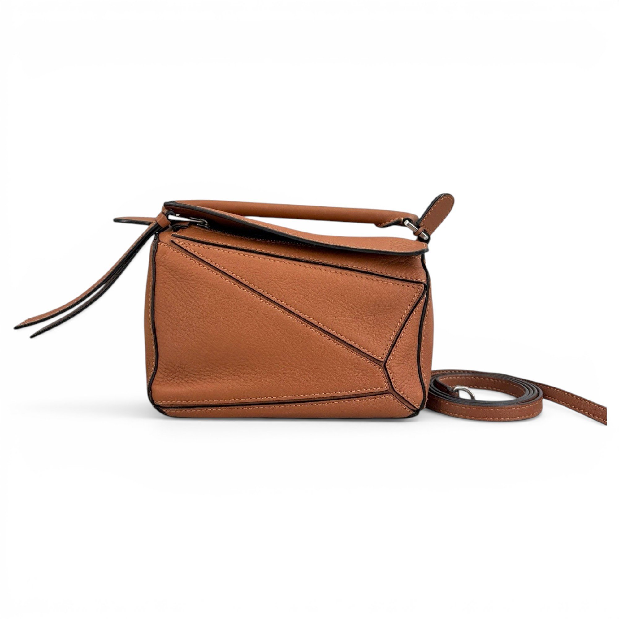 Puzzle leather handbag