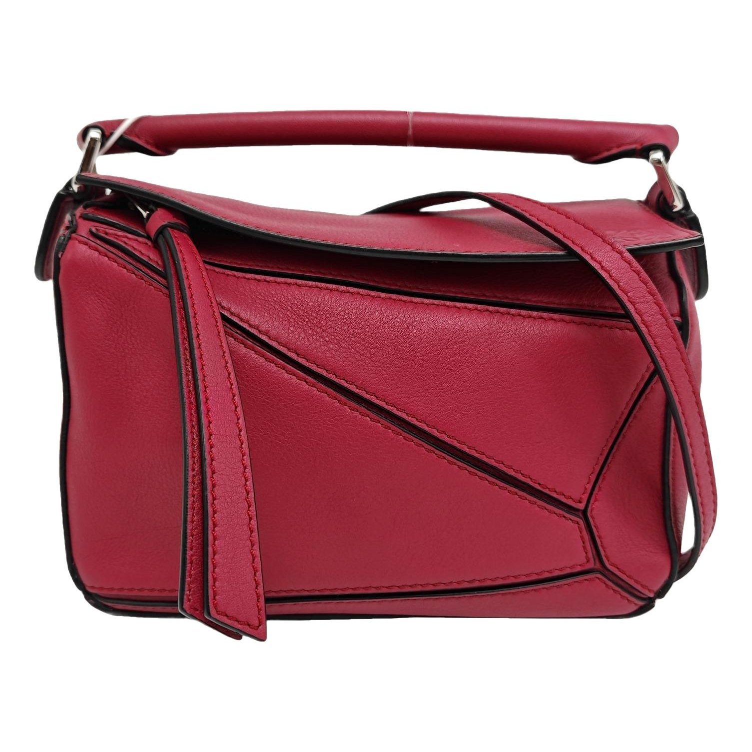 Puzzle leather handbag