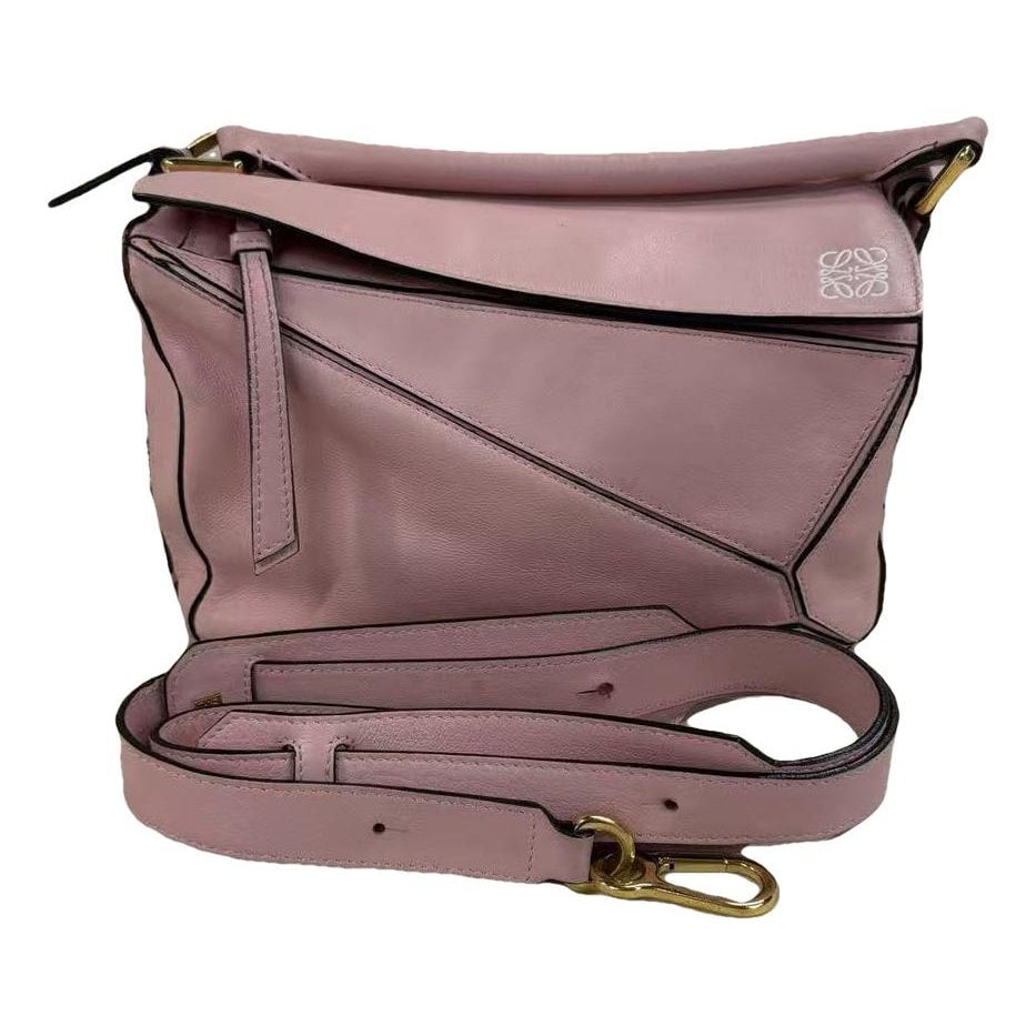 Puzzle leather handbag