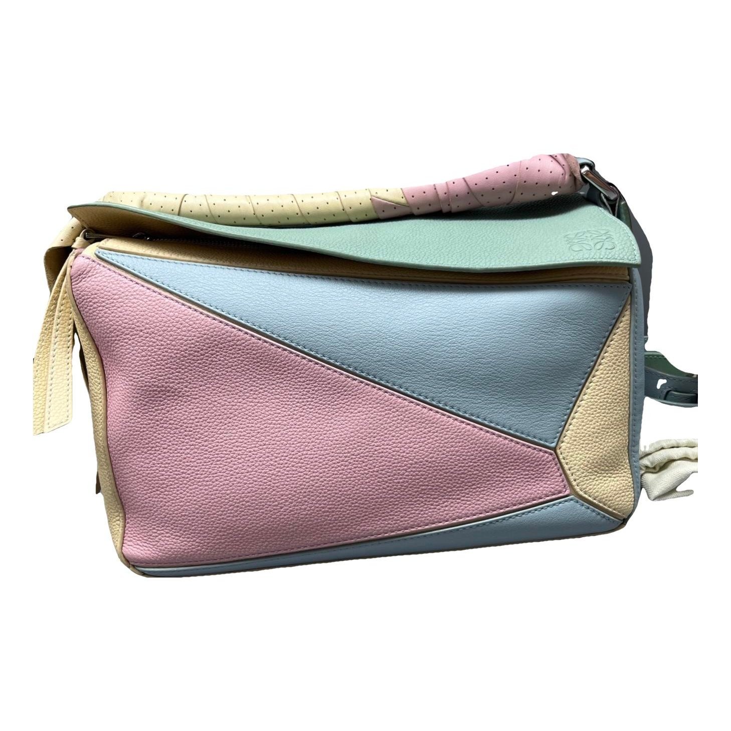 Puzzle leather handbag