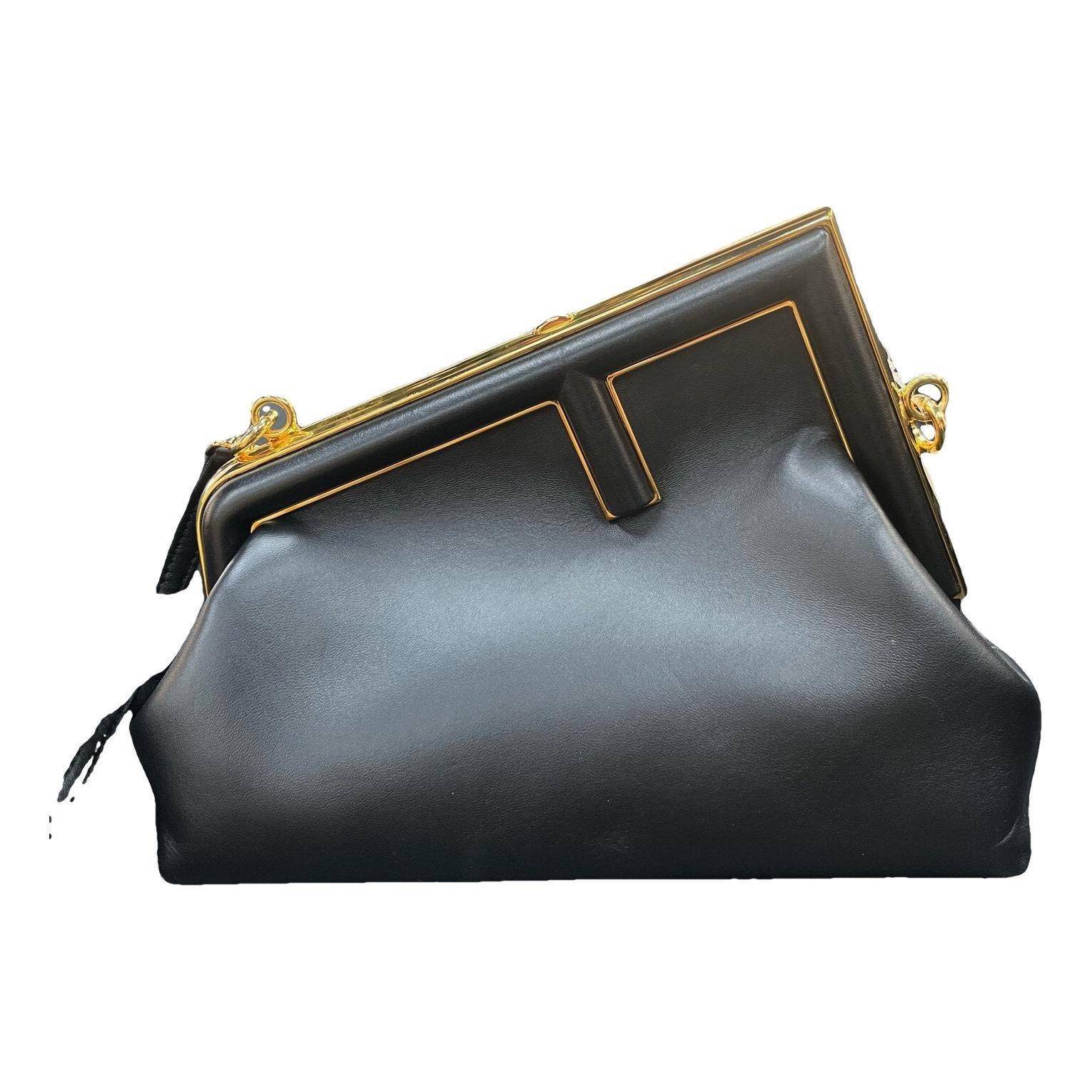 First leather handbag