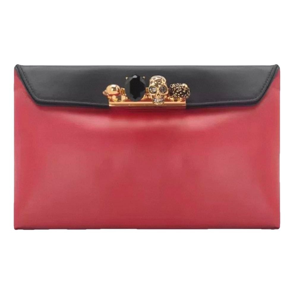 Knuckle leather clutch bag