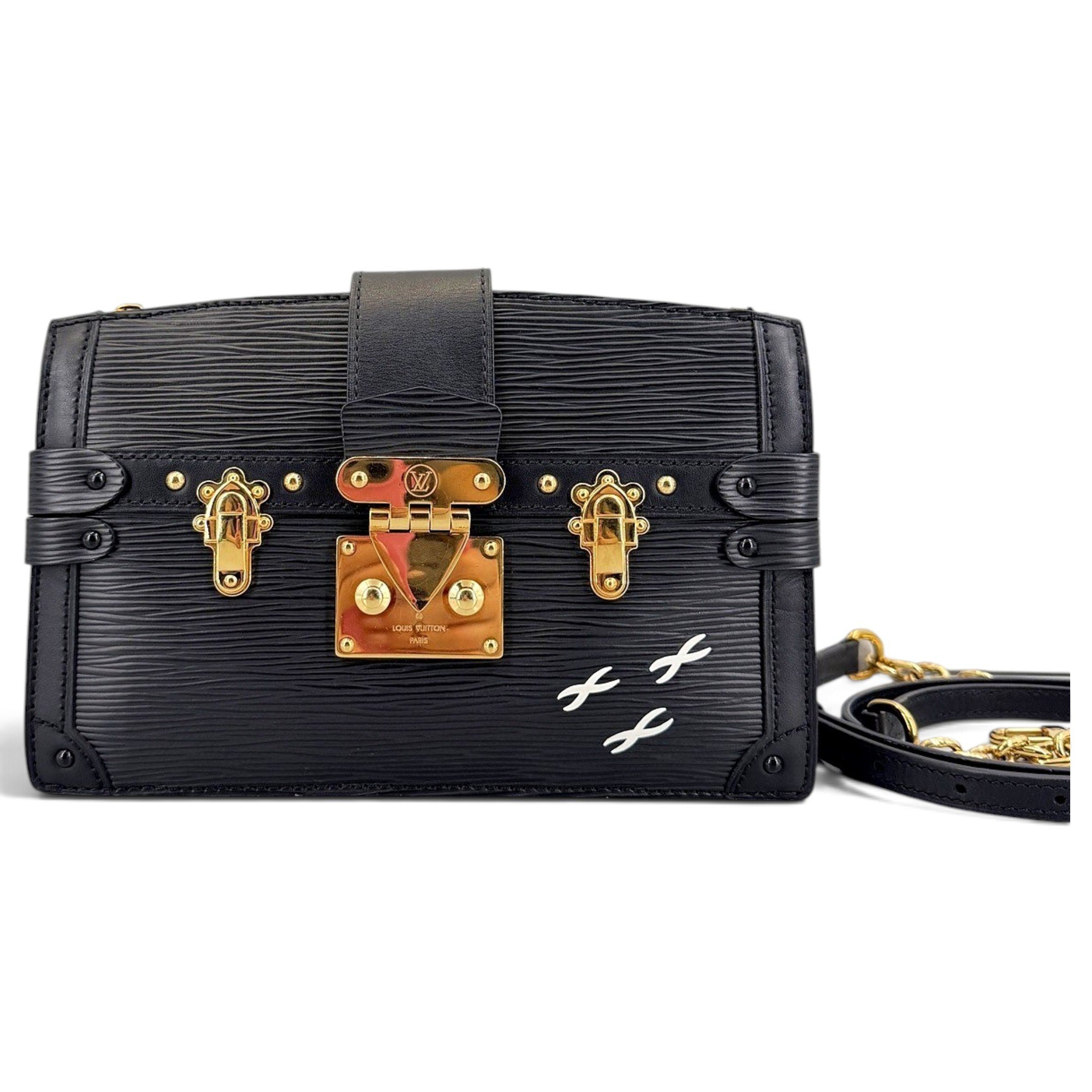 Pochette Trunk leather handbag