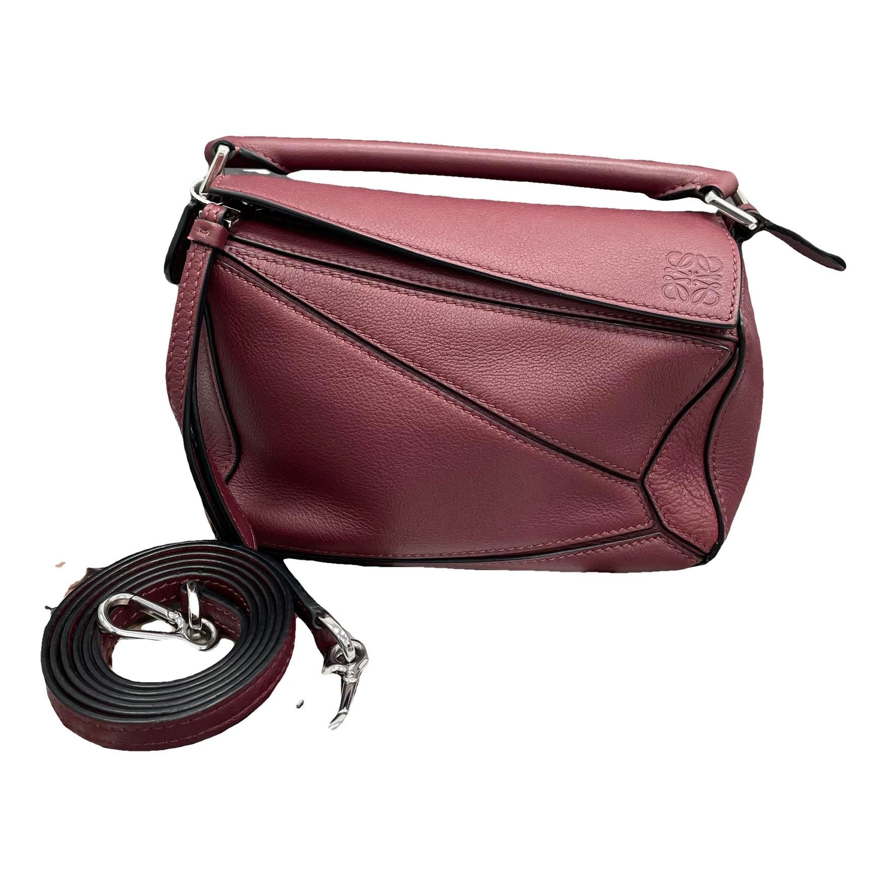 Puzzle leather handbag