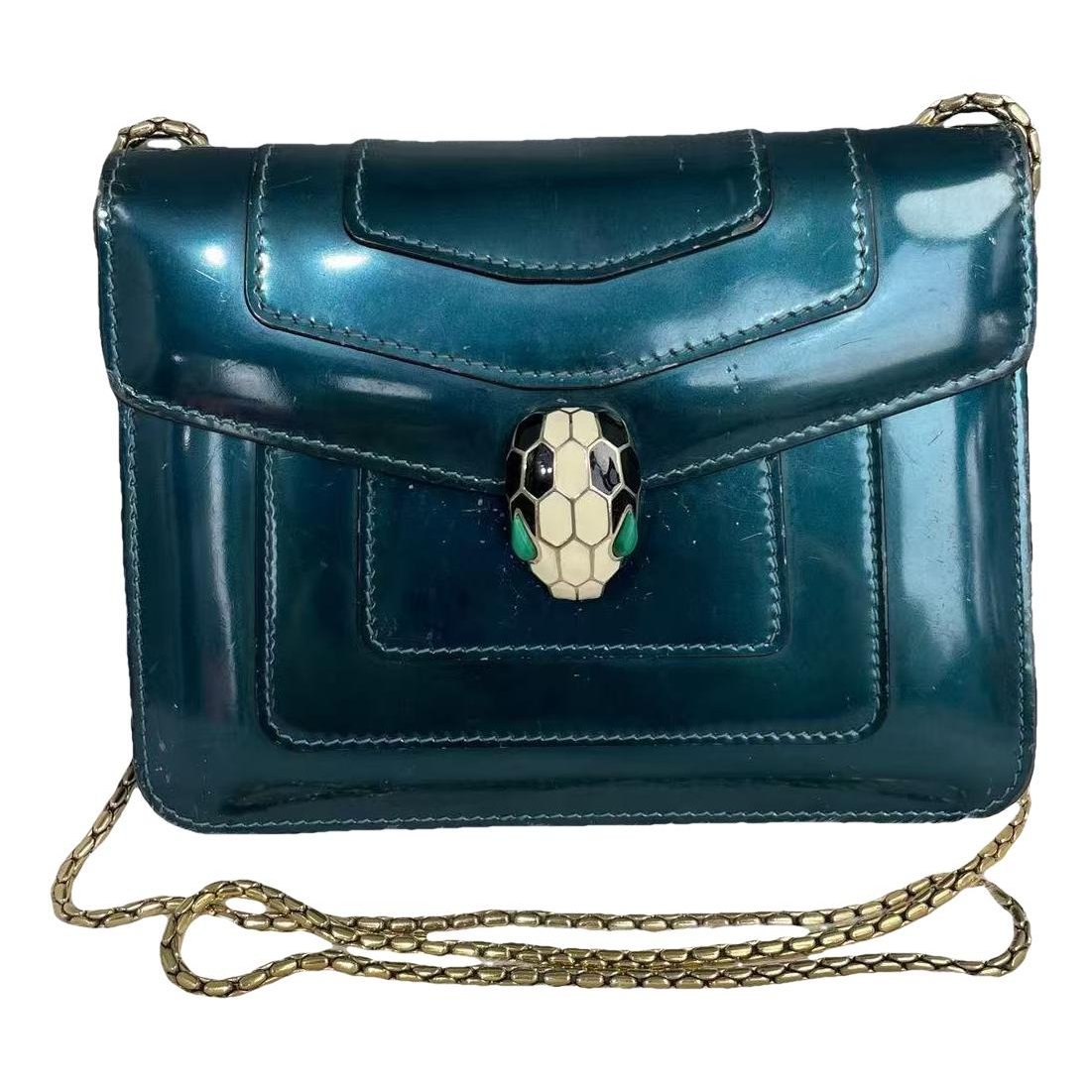 Serpenti patent leather handbag