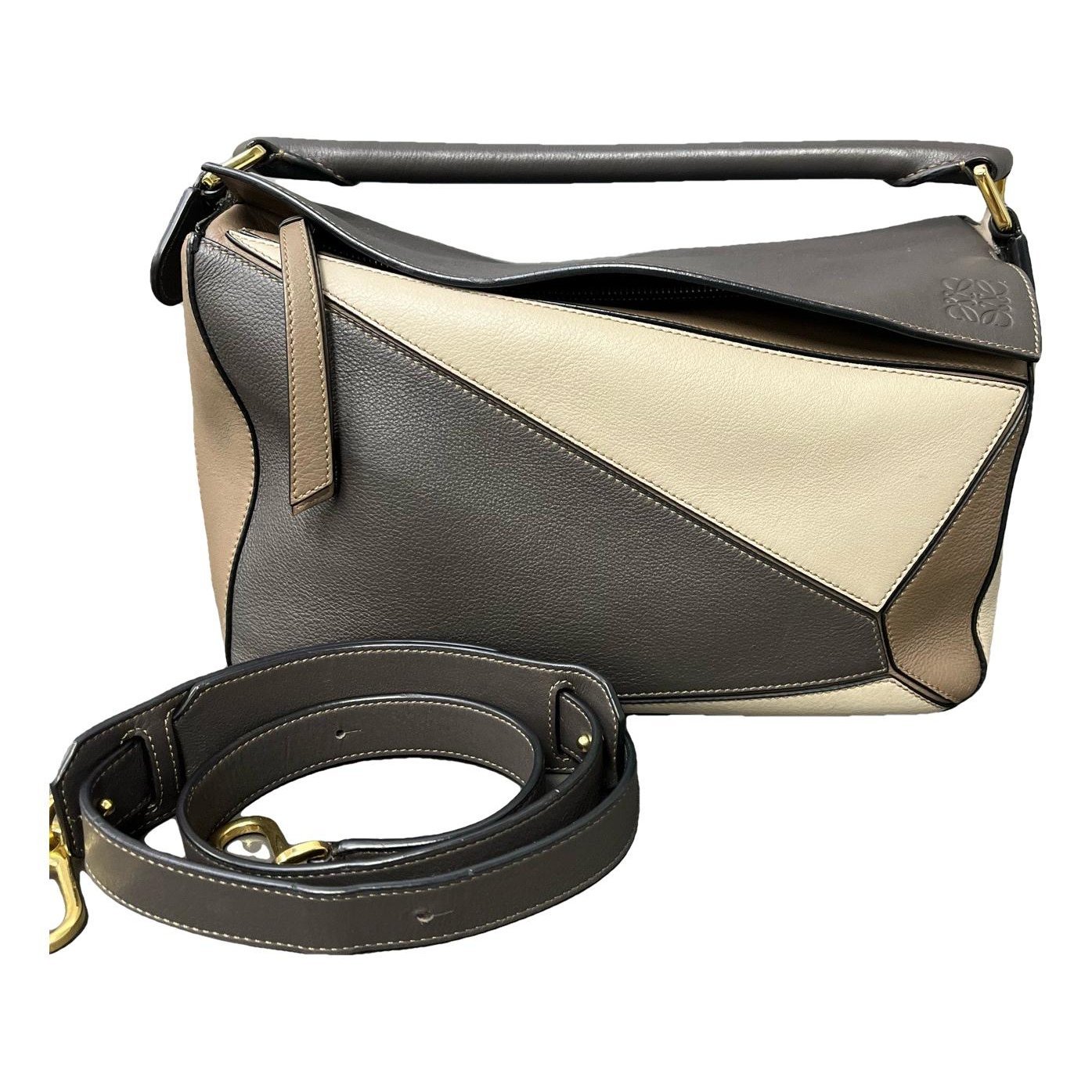 Puzzle leather handbag