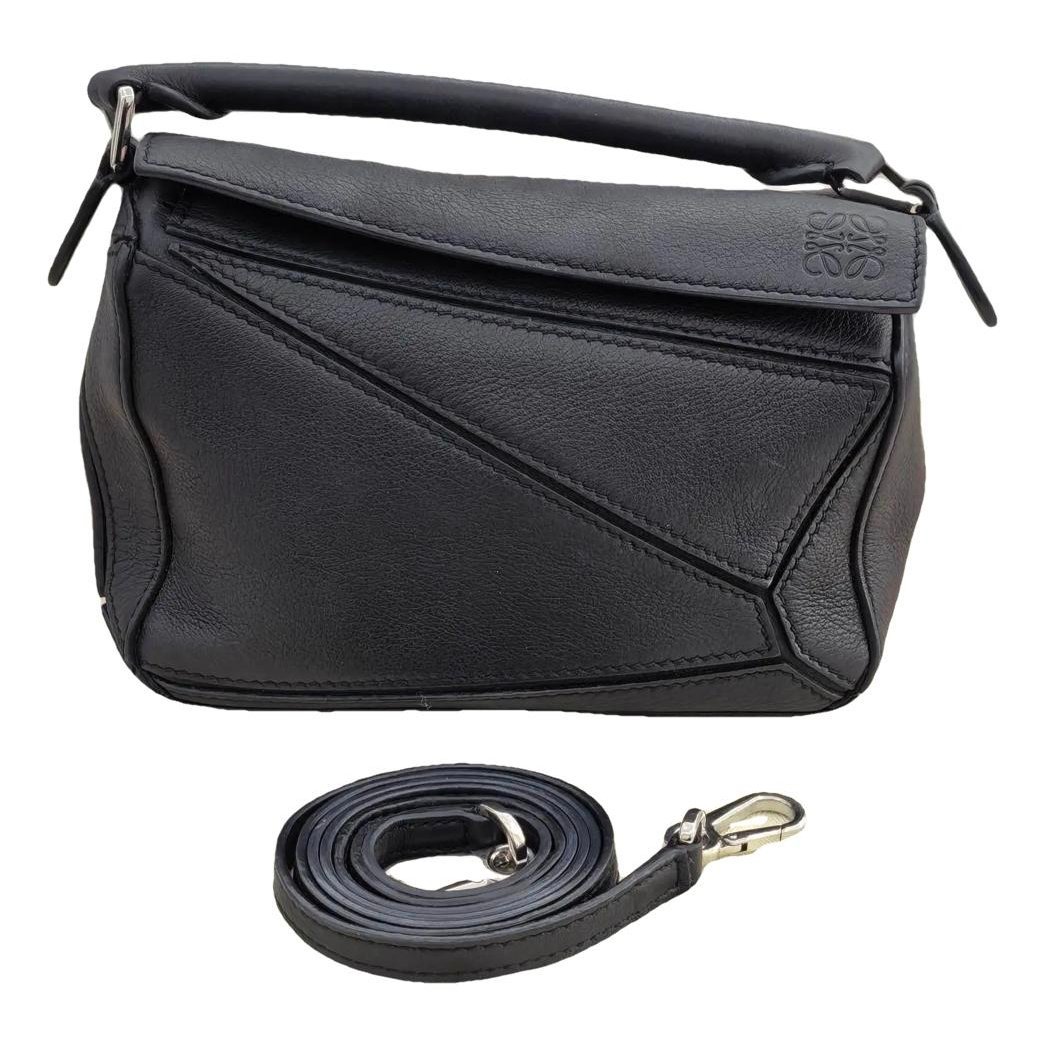 Puzzle leather crossbody bag
