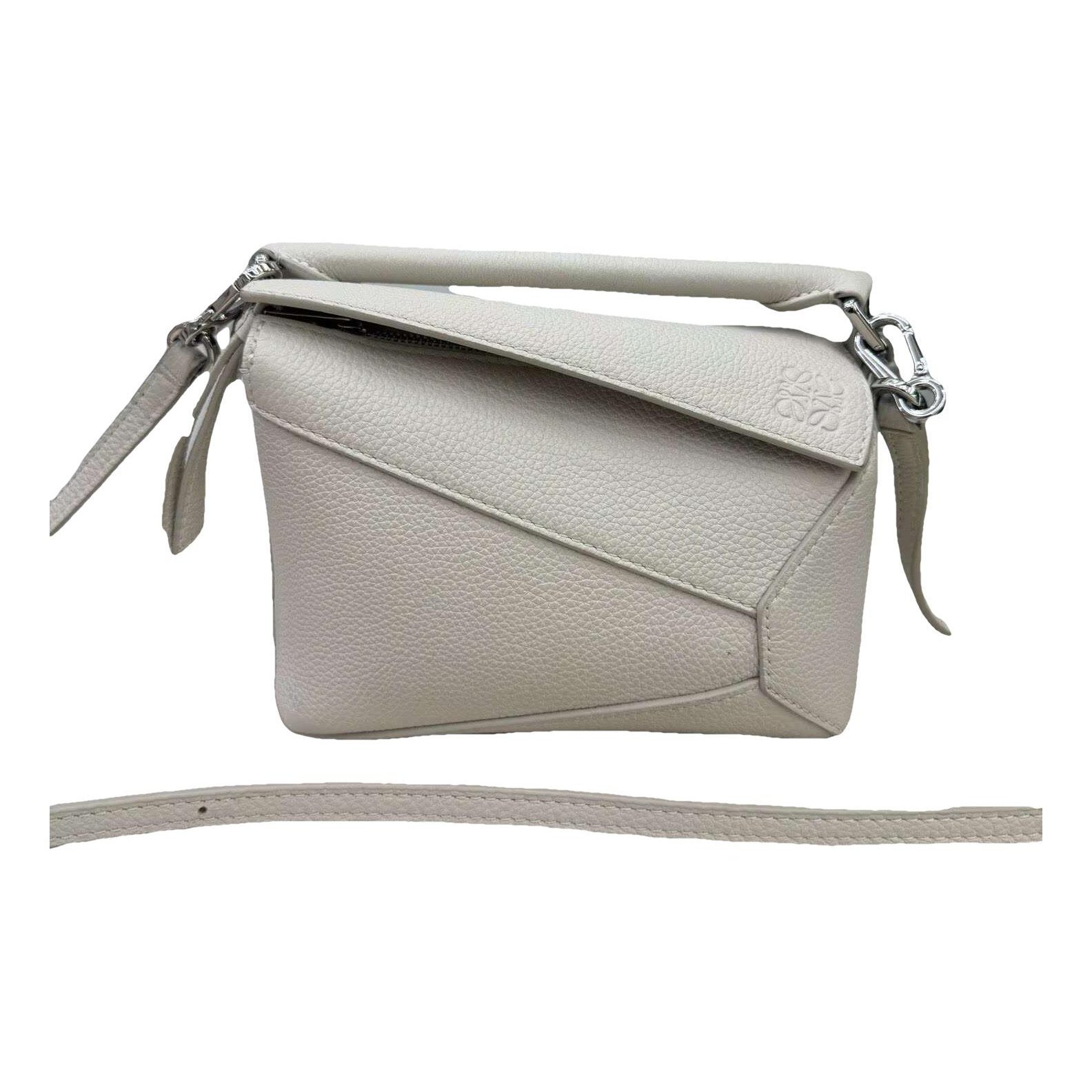 Puzzle leather handbag