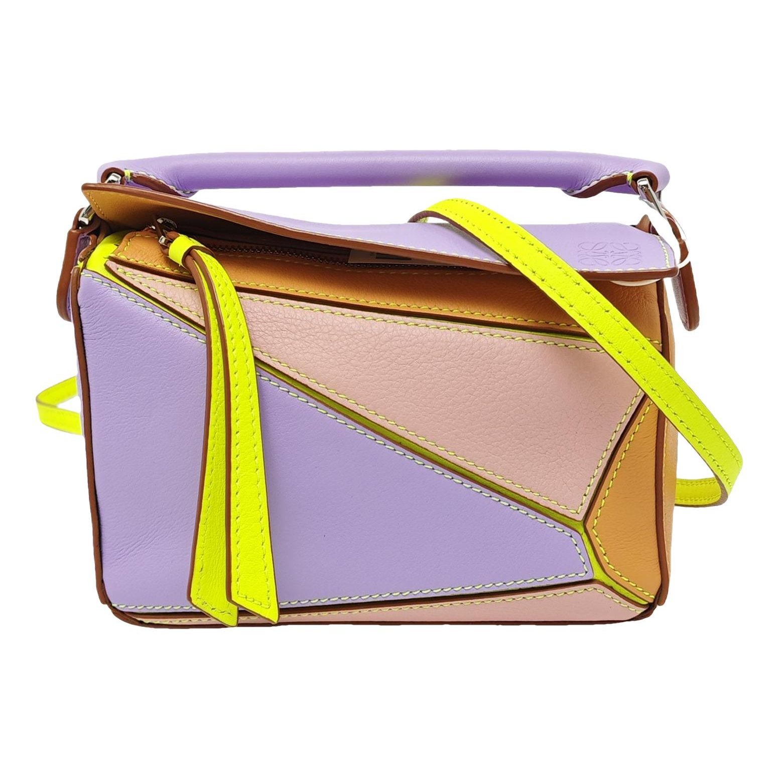 Puzzle leather handbag
