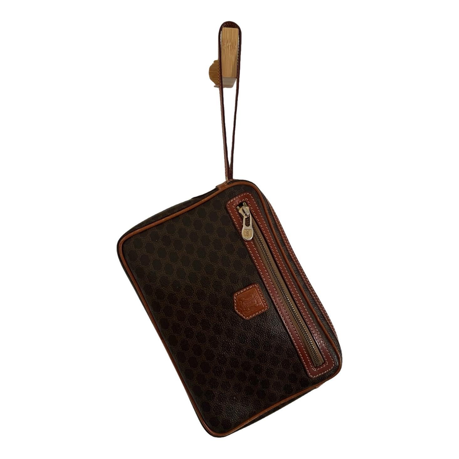 Triomphe Vintage leather clutch bag