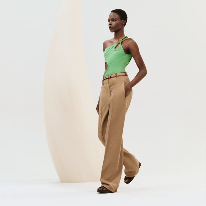 Loose fit pants with leather detail
