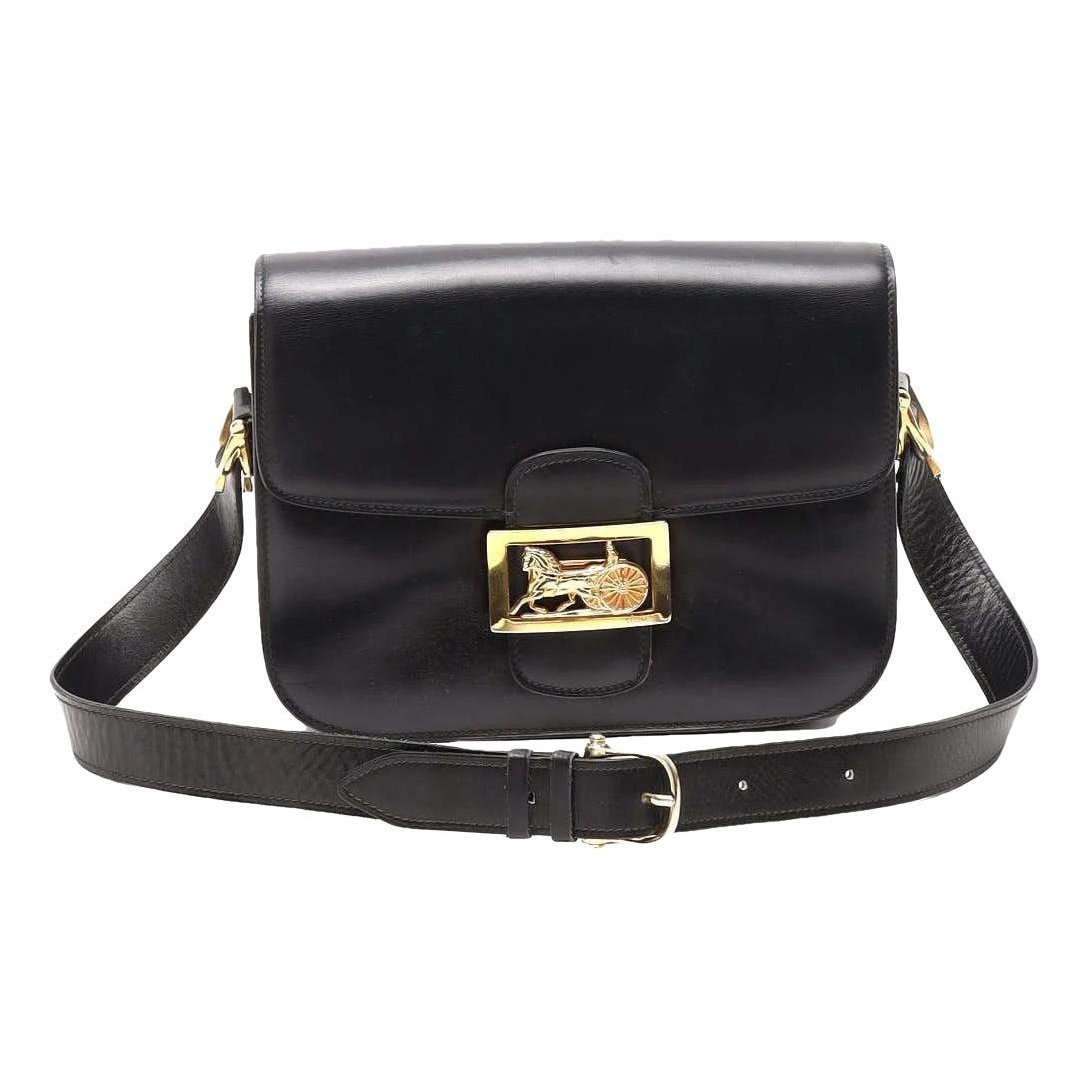 Clasp box leather handbag