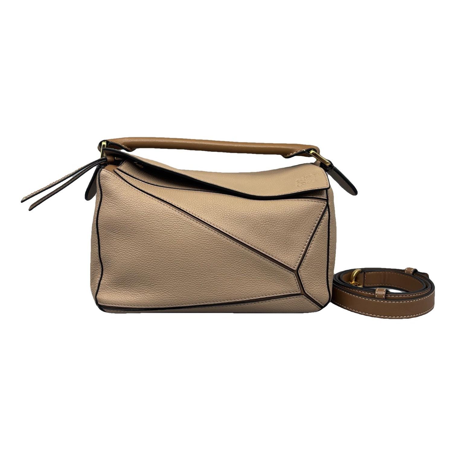 Puzzle leather handbag