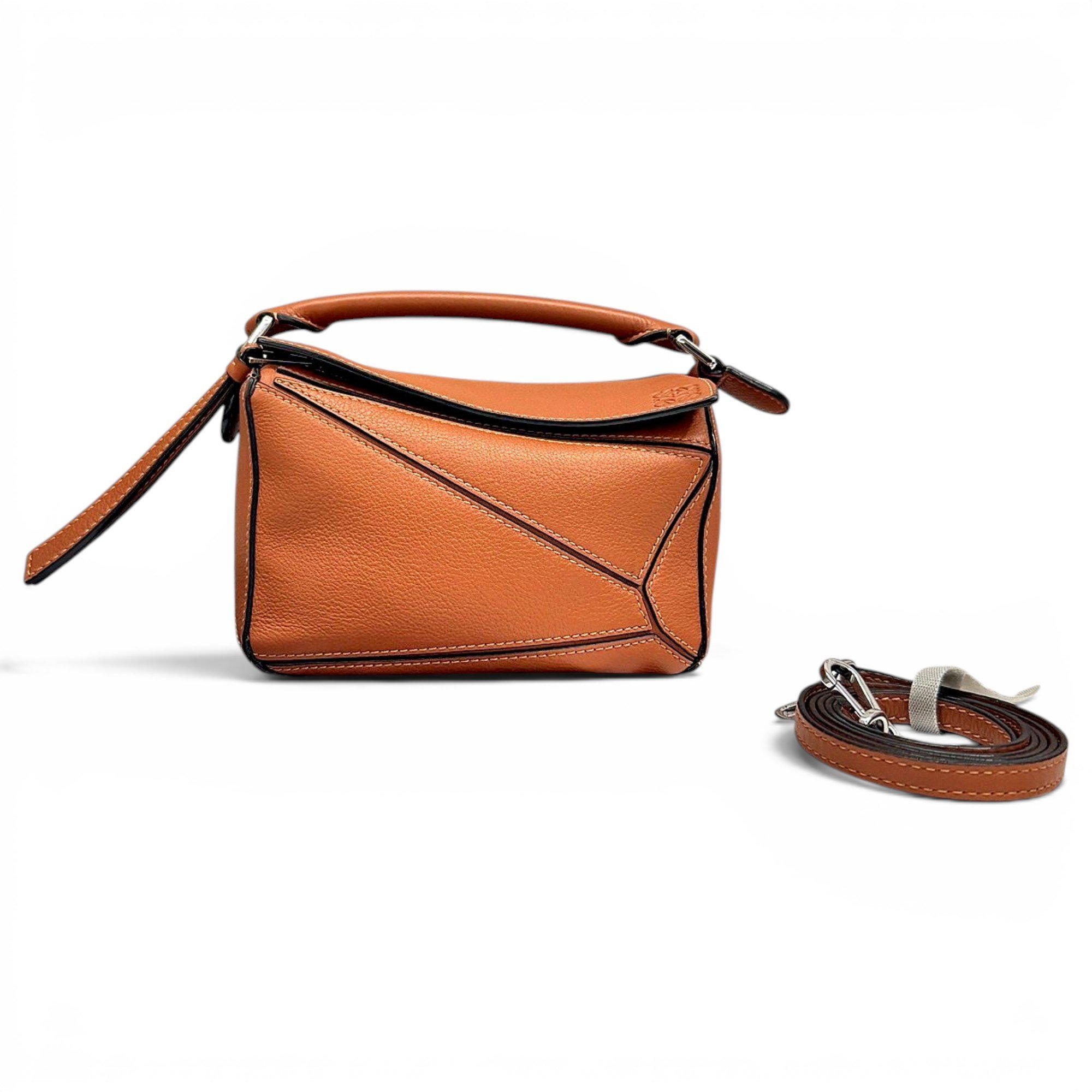 Puzzle leather handbag