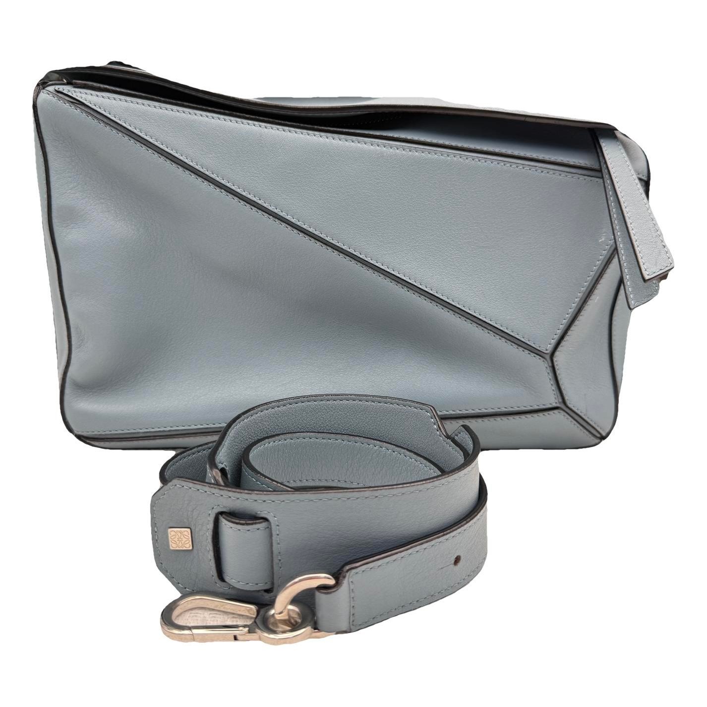 Puzzle leather handbag