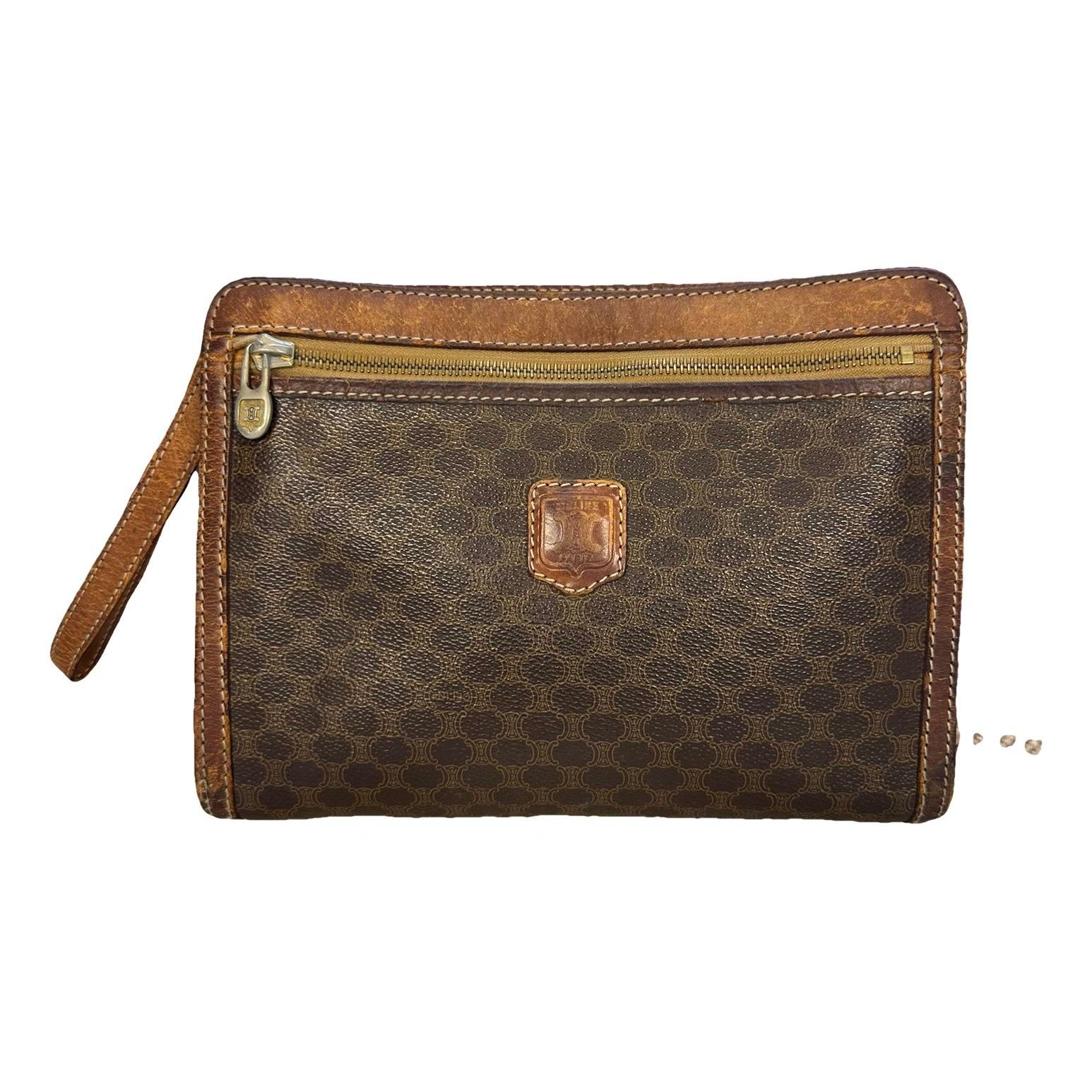 Triomphe Vintage leather clutch bag