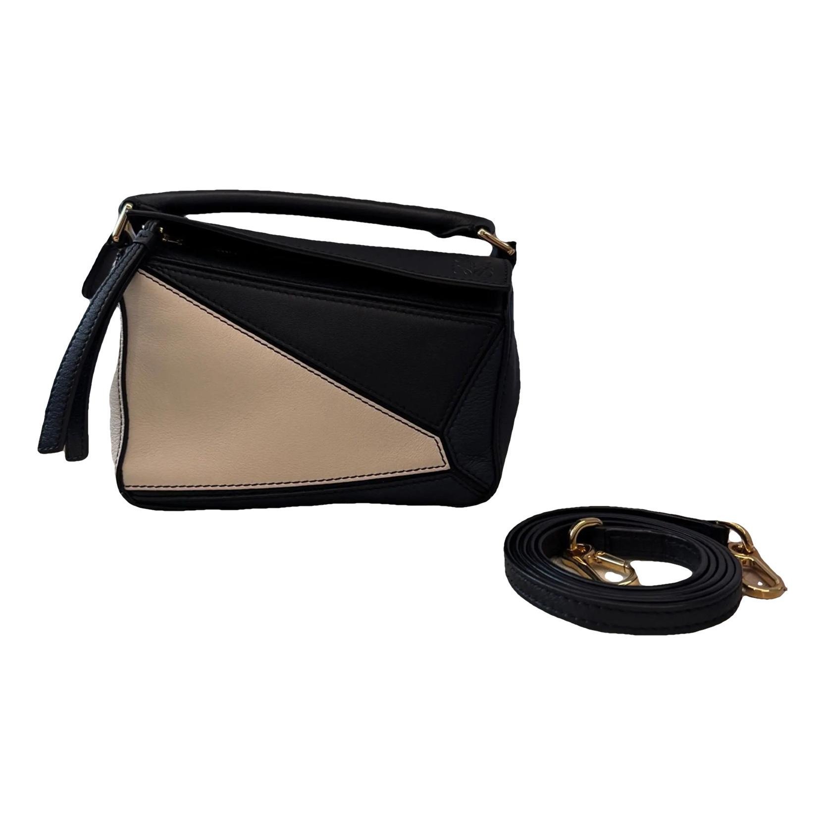 Puzzle leather crossbody bag