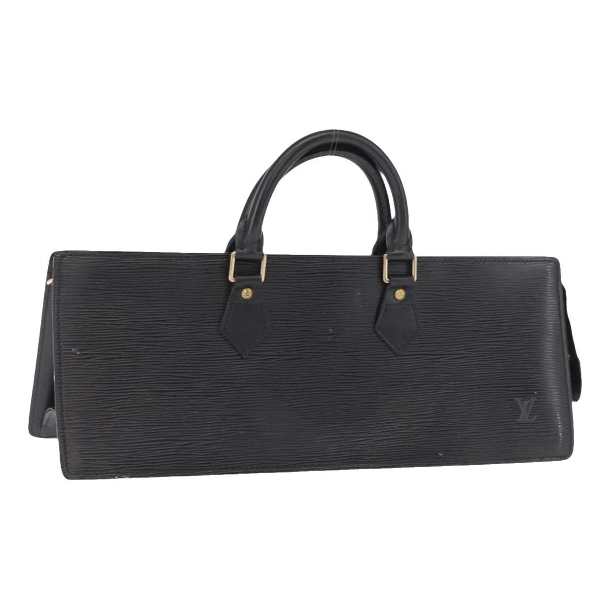 Triangle leather handbag